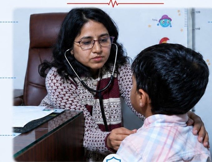 Doctor examining a patient at AIM Multispeciality Hospital